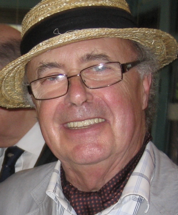 Aidan Powell wearing a straw hat